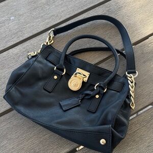 Michael Kors Black Leather Satchel with Gold-Tone Accents